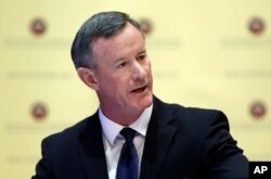 FILE - U.S. Navy Adm. William McRaven addresses the Texas Board of Regents, in Austin, Texas, Aug. 21, 2014.