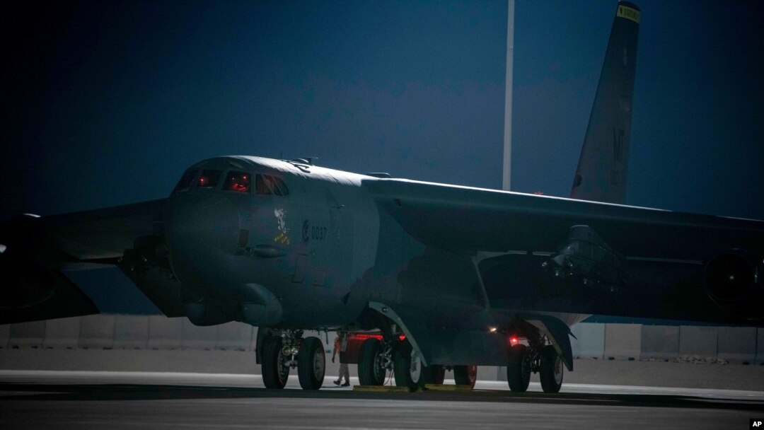 In this photo released by the U.S. Air Force, a B-52 bomber parks on the tarmac at Al-Udeid Air Base in Qatar on April 23, 2021. The U.S. Air Force has positioned two B-52 bombers in Qatar to support the American withdrawal from Afghanistan.