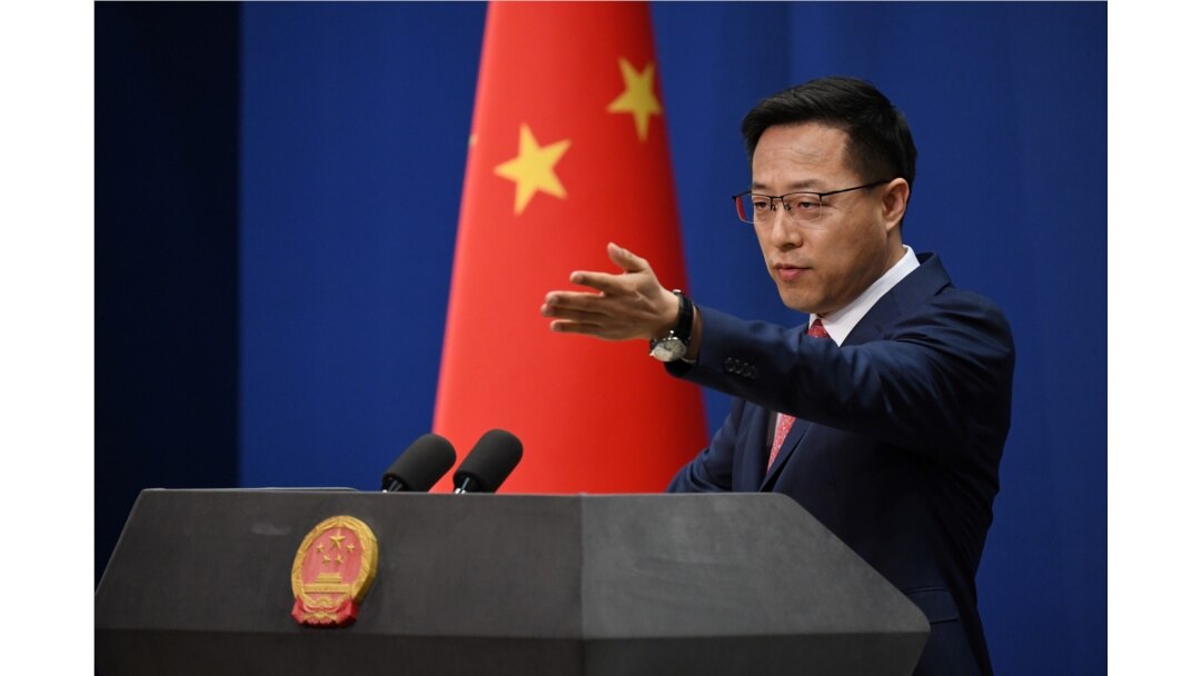 FILE - Chinese Foreign Ministry spokesman Zhao Lijian takes a question at the daily media briefing in Beijing, April 8, 2020.