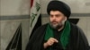 Shi'ite cleric Moqtada al-Sadr speaks with the Alhurra television network. 