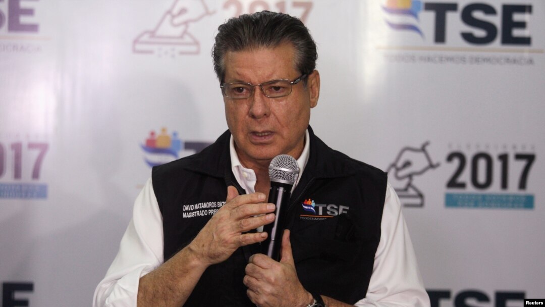 David Matamoros, president of the Supreme Electoral Tribunal, addresses the media in Tegucigalpa, Honduras, Dec. 1, 2017.
