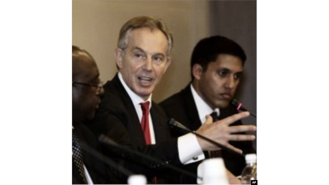 Former British Prime Minister Tony Blair, second from right, during the 4th High-Level Forum on Aid Effectiveness in Busan, South Korea, November 29, 2011.
