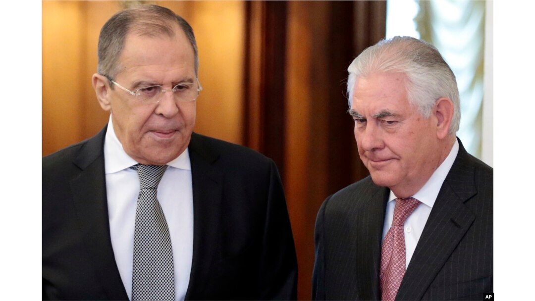 U.S. Secretary of State Rex Tillerson and Russian Foreign Minister Sergei Lavrov enter a hall prior to their talks in Moscow, April 12, 2017.