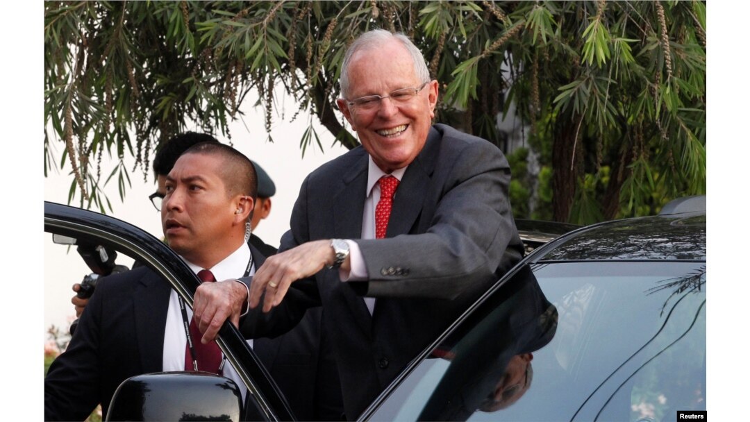 President Pedro Pablo Kuczynski leaves after a meeting with opposition leader Keiko Fujimori in Lima, Peru, Dec. 19, 2016.