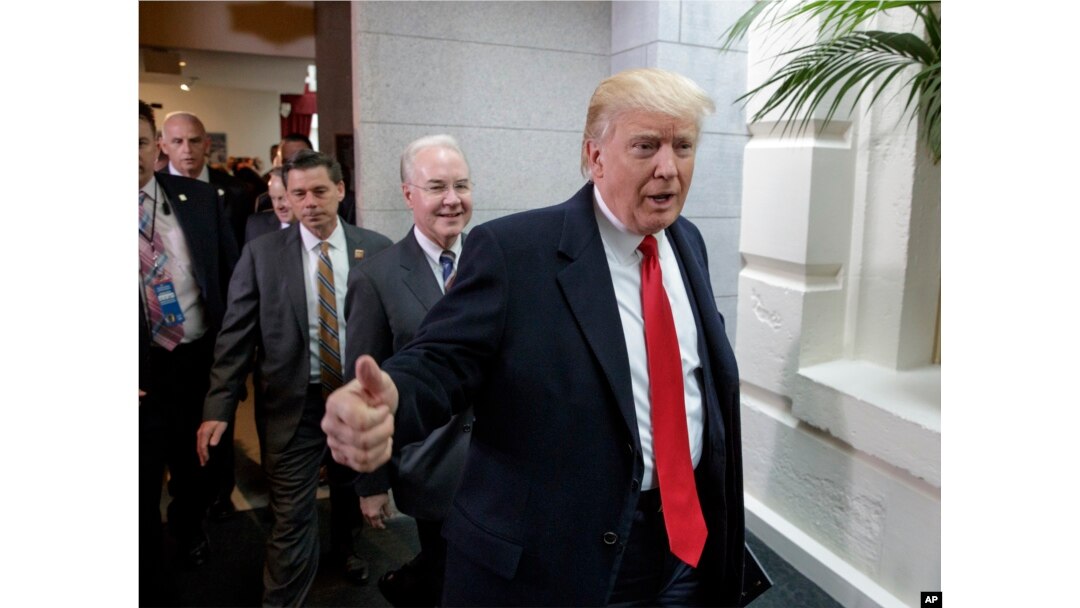 FILE - President Donald Trump and Health and Human Services Secretary Tom Price arrive on Capitol Hill in Washington, March 21, 2017, to rally support for the Republican health care overhaul by taking his case directly to GOP lawmakers.