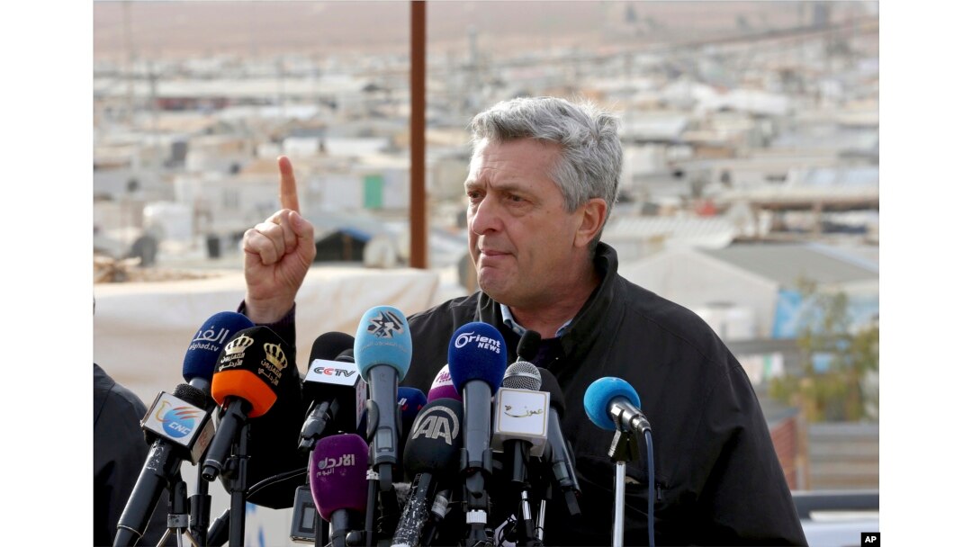 FILE - U.N. refugee chief Filippo Grandi speaks to the press during a visit to the Zaatari Syrian Refugee Camp, in Mafraq, Jordan, Feb. 12, 2018.
