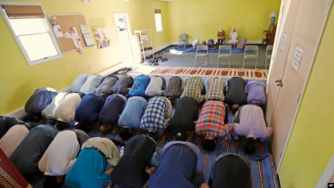 FILE – In this Sept. 23, 2016, photo, Muslim worshippers pray during a service at the Bernards Township Community Center in Basking Ridge, New Jersey.