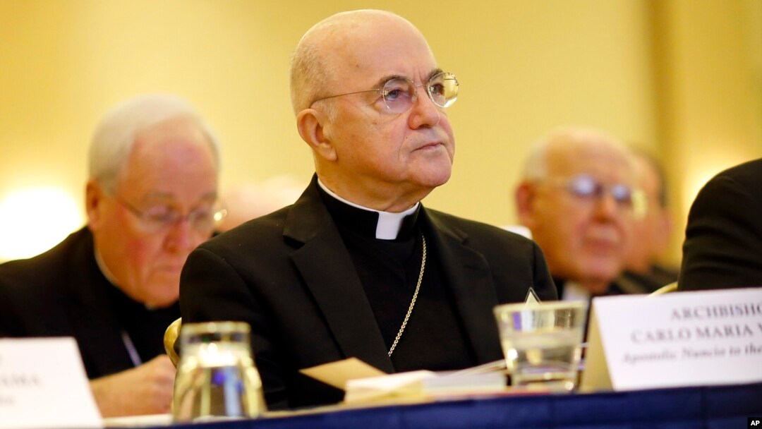 FILE - Archbishop Carlo Maria Vigano, Apostolic Nuncio to United States, listens to remarks at the United States Conference of Catholic Bishops' annual fall meeting, Nov. 16, 2015, in Baltimore.