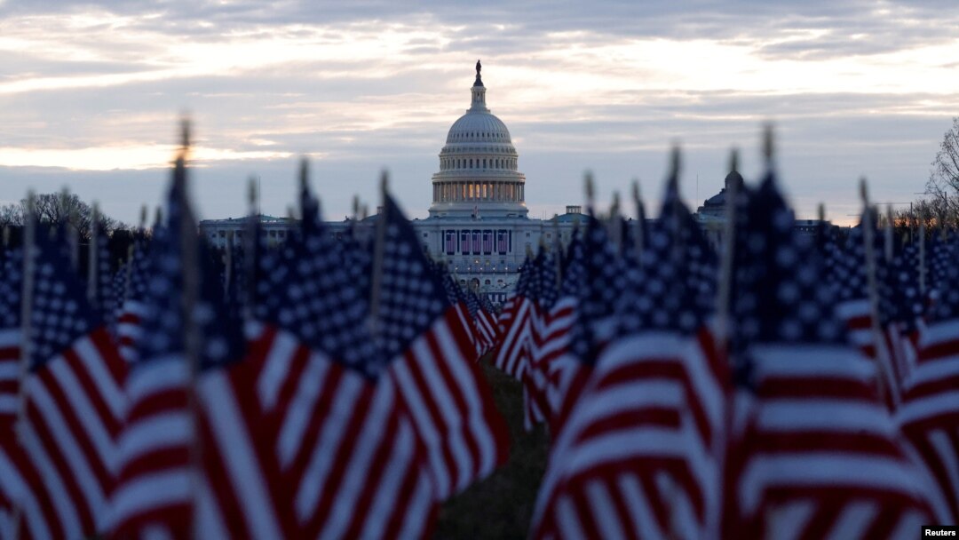 Thousands of U.S. flags are seen at the National Mall near the Capitol, ahead of Joe Biden's inauguration as president, in Washington, Jan. 18, 2021. 