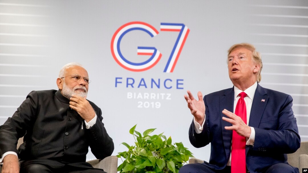 President Donald Trump, accompanied by Indian Prime Minister Narendra Modi, left, speaks during a bilateral meeting at the G-7 summit in Biarritz, France, Aug. 26, 2019.