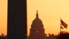 The Washington Monument and the U.S. Capitol are seen in Washington, March 18, 2020.