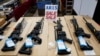 FILE - AR-15 rifles are displayed for sale at a gun show in Pennsylvania, Oct. 6, 2017. 