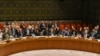 Ambassadors to the U.N. vote during a United Nations Security Council meeting on North Korea in New York City, Sept. 11, 2017. 