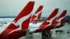 FILE - Qantas aircraft are seen on the tarmac at Melbourne International Airport in Melbourne, Australia, Nov. 6, 2018. 
