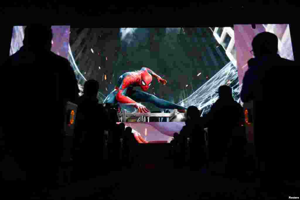 Sony Playstation executives showcase the Spider-Man game as they demonstrate upcoming releases during a news conference at E3 2017 in Los Angeles, California, June 12, 2017.