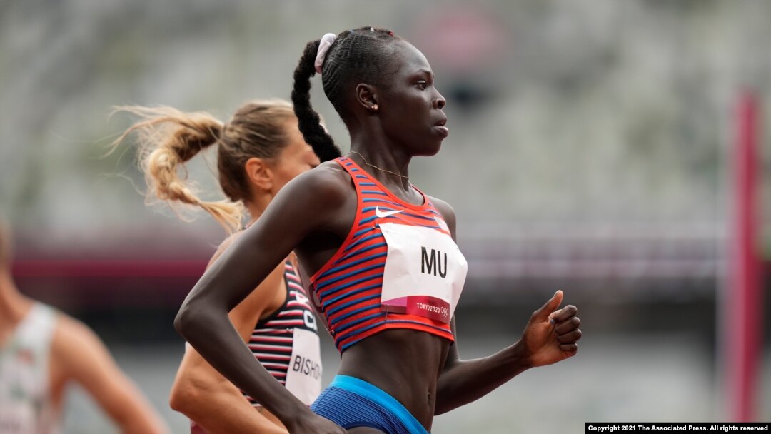 Athing Mu, of United States, wins a heat in the women's 800-meter run at the 2020 Summer Olympics, July 30, 2021, in Tokyo.