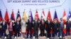 ASEAN leaders and delegates pose for a photo during a working lunch on the sidelines of the 33rd ASEAN summit in Singapore, Nov. 14, 2018. 
