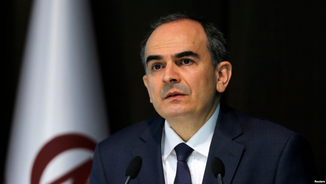 FILE - Turkey's Central Bank Governor Erdem Basci addresses the media in Ankara, Jan. 28, 2014.
