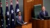 Indonesia's President Joko Widodo, left, address the Australian Parliament in Canberra, as the speaker of the house, Tony Smith, right, listens, Feb. 10, 2020. 
