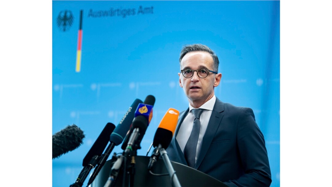 FILE - German Foreign Minister Heiko Maas briefs the media during a news conference on current developments in the worldwide spread of the coronavirus at the foreign ministry in Berlin, March 17, 2020.