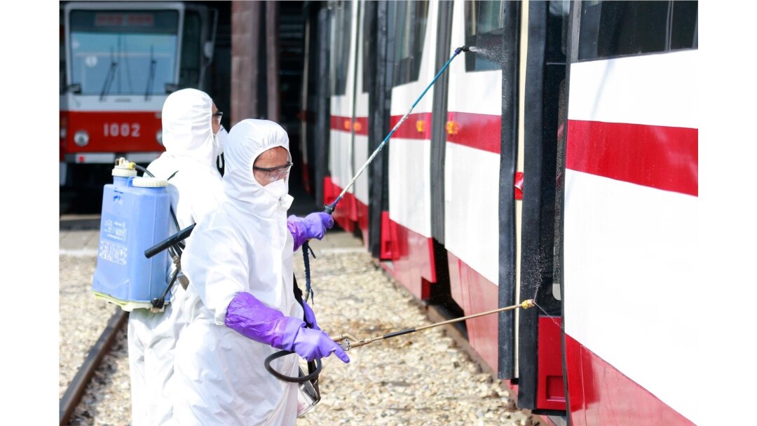 Members from an emergency anti-epidemic headquarters in Mangyongdae District, disinfect a tramcar of Songsan Tram Station to prevent new coronavirus infection in Pyongyang, North Korea, Feb. 26, 2020.