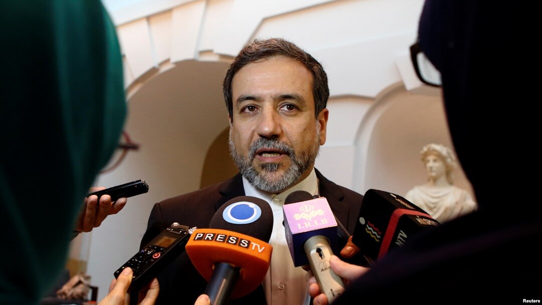 FILE: Iran's top nuclear negotiator, Abbas Araqchi, talks to journalists after meeting senior officials from the United States, Russia, China, Britain, Germany and France in a hotel in Vienna, Austria, Oct. 19, 2015. 