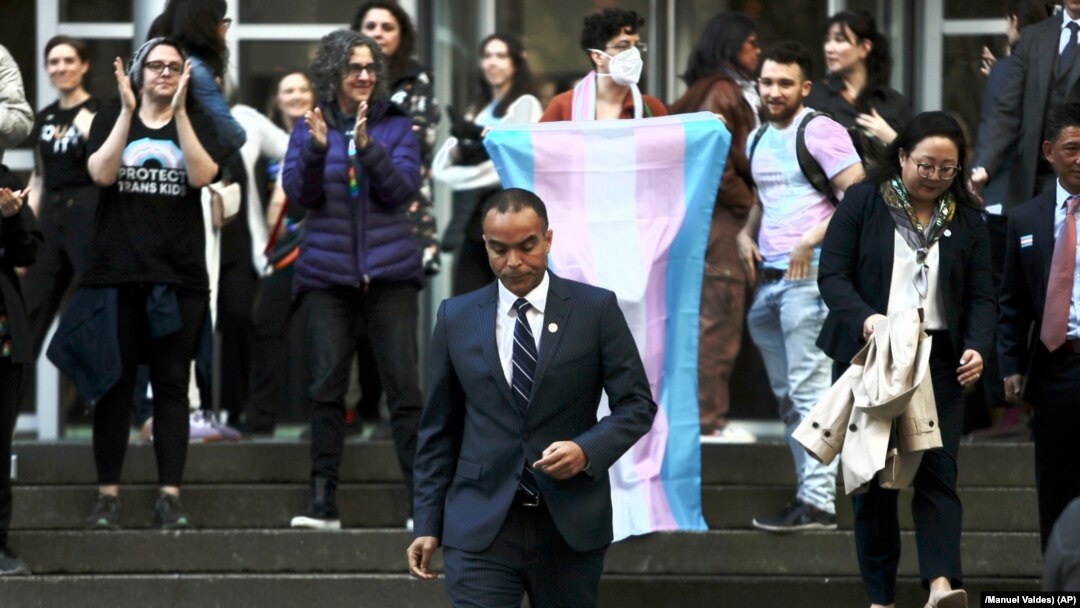 FILE- Washington Attorney General Nick Brown walks down the steps of a federal court in Seattle after a hearing over President Donald Trump's order against gender-affirming care for youth, Feb. 28, 2025.