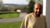 Ethiopian opposition figure Berhanu Nega, shown at his home in Pennsylvania, April 25, 2009, is calling for talks with the government in Addis Ababa following the death of Prime Minister Meles Zenawi.