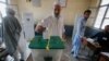 FILE - A Pakistani tribesman cast his vote during an election for provincial seats in Jamrud, a town of Khyber district, Pakistan, July 20, 2019. 