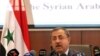 Syria's Interior Minister Mohammed al-Shaar announces the results of the referendum on a new constitution in Damascus, February 27, 2012.