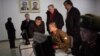 Executive Chairman of Google Eric Schmidt and former governor of New Mexico Bill Richardson look at soldiers working on computers at the Grand Peoples Study House, Pyongyang, North Korea, January 9, 2013.