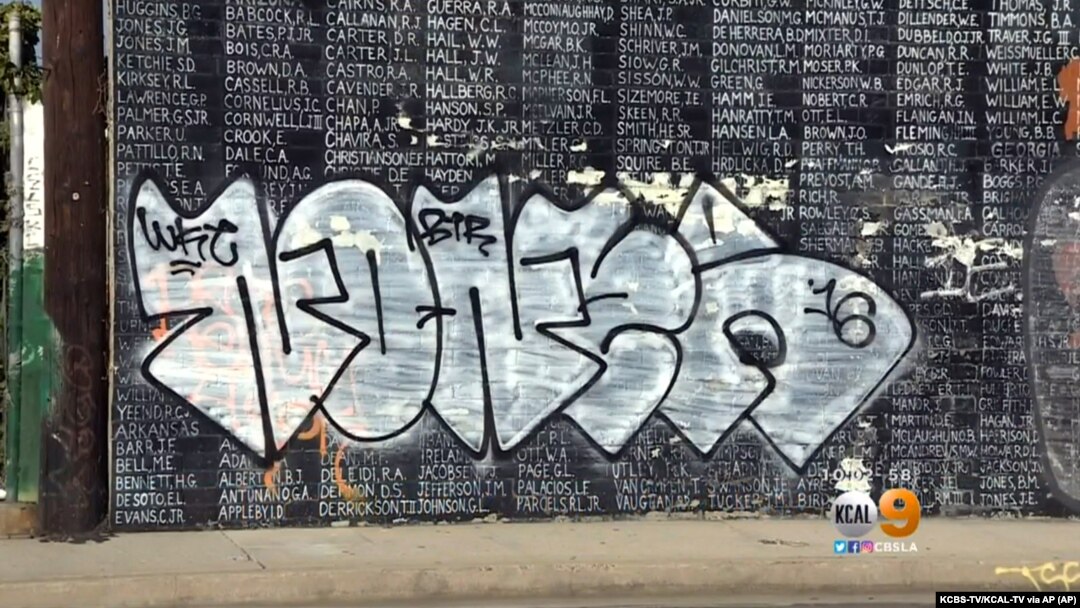 Graffiti is shown on a Vietnam War memorial in the Venice area of Los Angeles, May 27, 2016. The memorial lists the names of American service members missing in action or unaccounted for in Southeast Asia, painted by a Vietnam veteran and dedicated in 199