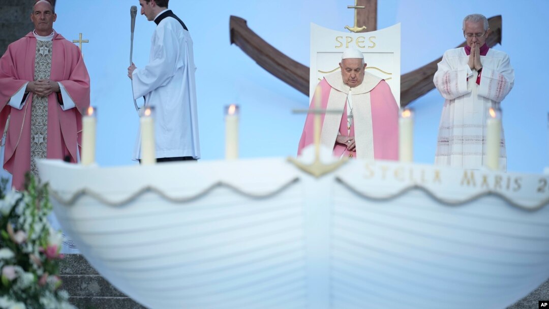 Pope Francis presides over a mass in Ajaccio "Place d'Austerlitz" during his visit in the French island of Corsica, Dec. 15, 2024.