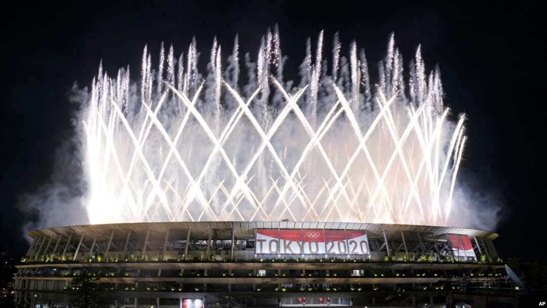 Fireworks illuminate the National Stadium during the opening ceremony of the 2020 Summer Olympics in Tokyo, Japan, July 23, 2021.