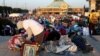 Millions mark Mexico's Virgin of Guadalupe Day, but calls for a truce in drug violence go unheeded 