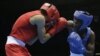 Kenya's Benson Njangiru fights Egypt's Hesham Abdelaal, left, in boxing match at the 2012 Summer Olympics in London.