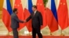 Chinese President Xi Jinping (R) shakes hands with Philippines President Rodrigo Duterte prior to their bilateral meeting during the Belt and Road Forum, at the Great Hall of the People in Beijing, China, May 15, 2017