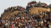 Mining community gathers at a hill dubbed the 'Hill of Horror' during a memorial service for miners killed during clashes at Lonmin's Marikana platinum mine in Rustenburg, 100 kilometers northwest of Johannesburg, South Africa, August 23, 2012.