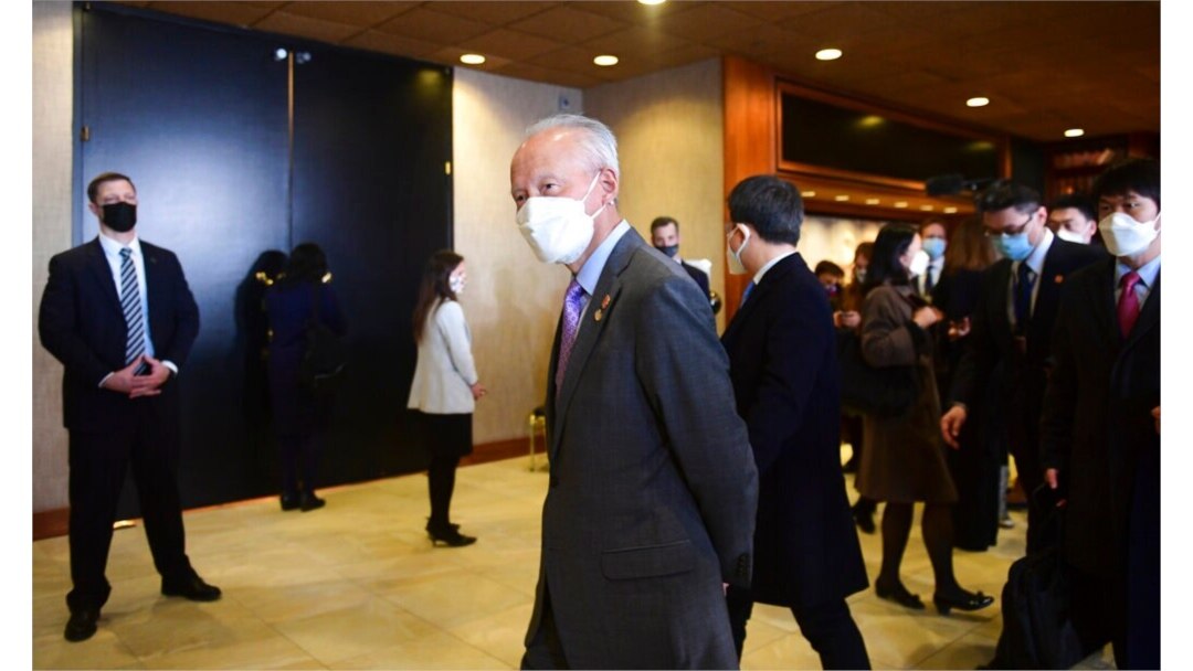 FILE - China's Ambassador to the U.S. Cui Tiankai walks past the closed-door morning session of U.S.-China talks in Anchorage, Alaska, March 19, 2021.
