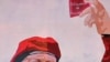 Venezuelan Muralists, Cartoonist, Paint Different Pictures of President Chavez