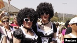 People take part in the Joburg Pride Parade in Johannesburg, South Africa, October 2, 2010. 