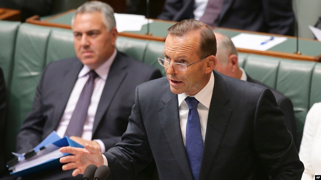 Australia's Prime Minister Tony Abbott speaks about the nation's new anti-extremism strategy during a question time at Parliament House in Canberra, Australia, Feb. 23, 2015. 