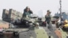 Soldiers on an amphibious assault vehicle communicate during military exercises at the Zuoying naval base in southern Taiwan, Jan. 18, 2017. Singapore and Taiwan will continue to carry out a military training program begun in 1975, Taiwan officials said this week.