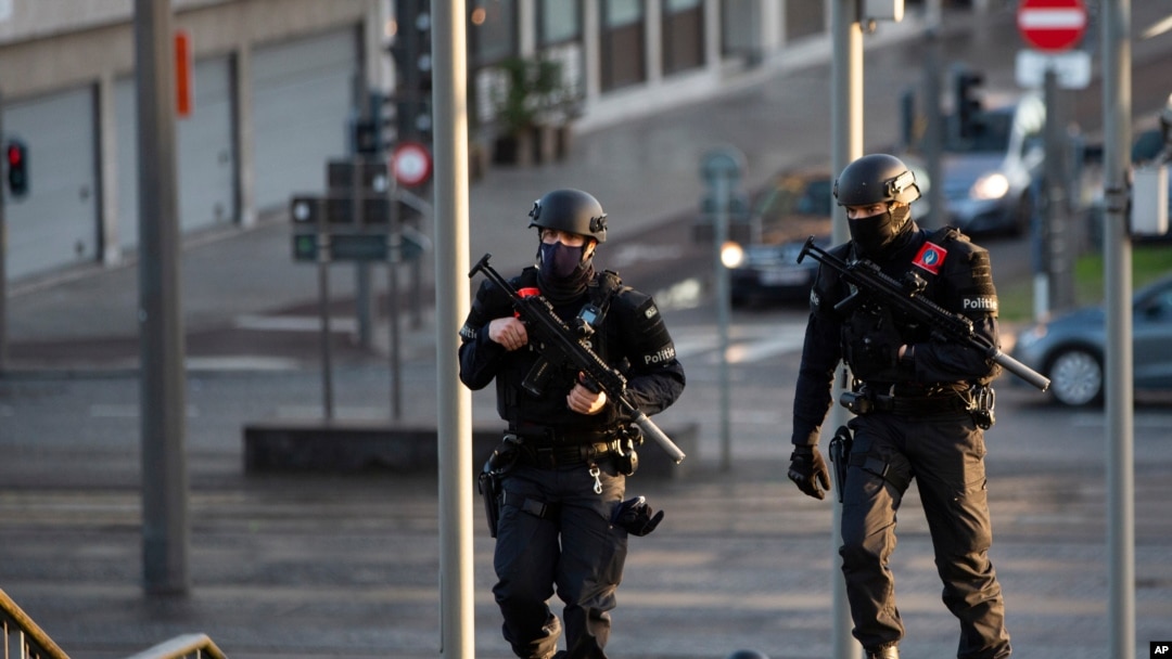 Police patrol during the trial of four persons, including an Iranian diplomate and Belgian-Iranian couple at the courthouse in Antwerp, Belgium, Feb. 4, 2021. 