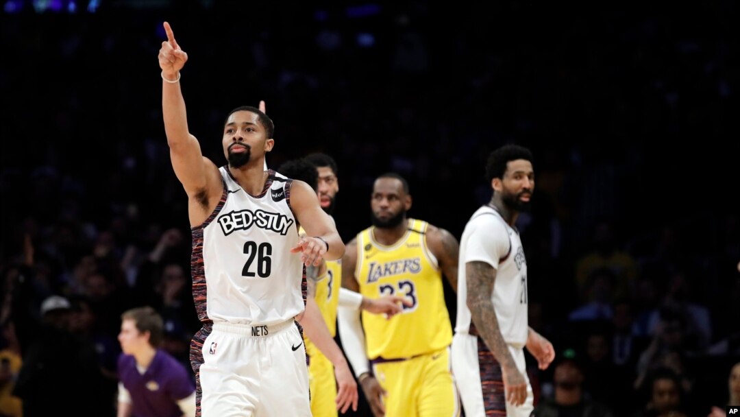 Brooklyn Nets' Spencer Dinwiddie (26) lobbies for a call to go in his team's favor during the second half of an NBA basketball game against the Los Angeles Lakers, March 10, 2020, in Los Angeles. 