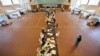 Electoral workers engage in vote tally verification process at National Tallying Center in Nairobi, Kenya, March 6, 2013
