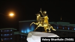 TURKMENISTAN - ASHGABAT, FEBRUARY 14, 2017: A monument to Turkmenistan's President Gurbanguly Berdimuhamedov. 