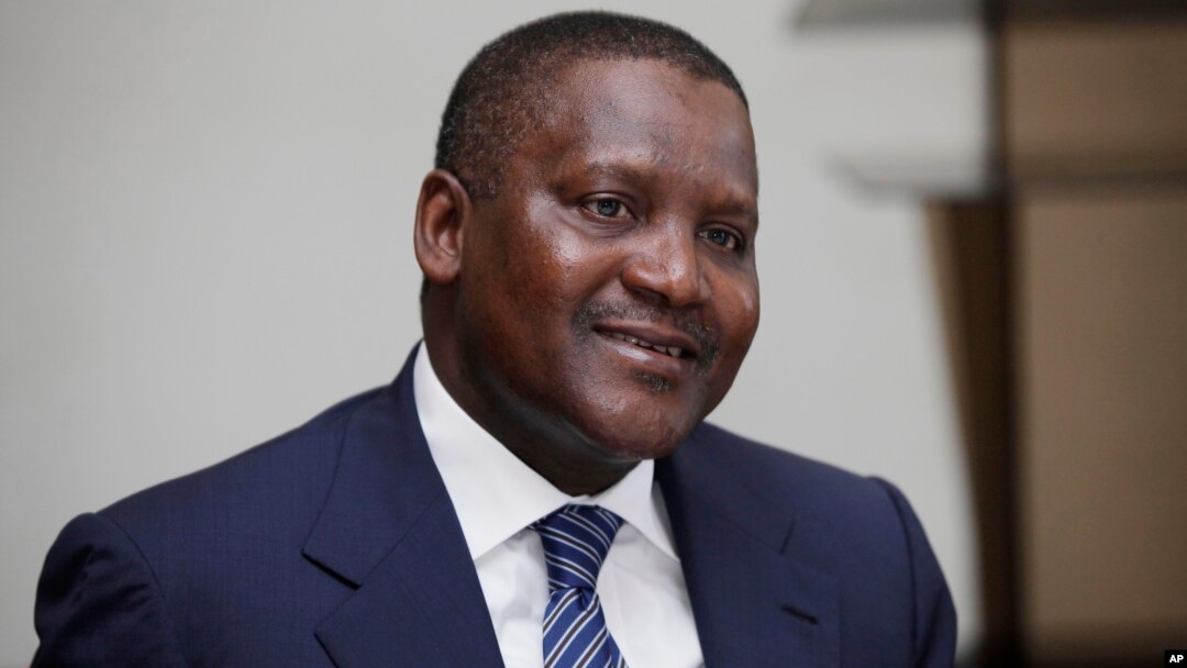 FILE - In this photo taken, Monday, Oct. 8, 2012 Nigerian billionaire businessman Aliko Dangote attends a global business environment meeting in Lagos, Nigeria. 