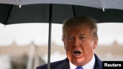 Президент Дональд Трамп розмовляє з журналістами перед відльотом у Лондон на саміт НАТО. Вашингтон 2 грудня 2019 р. 